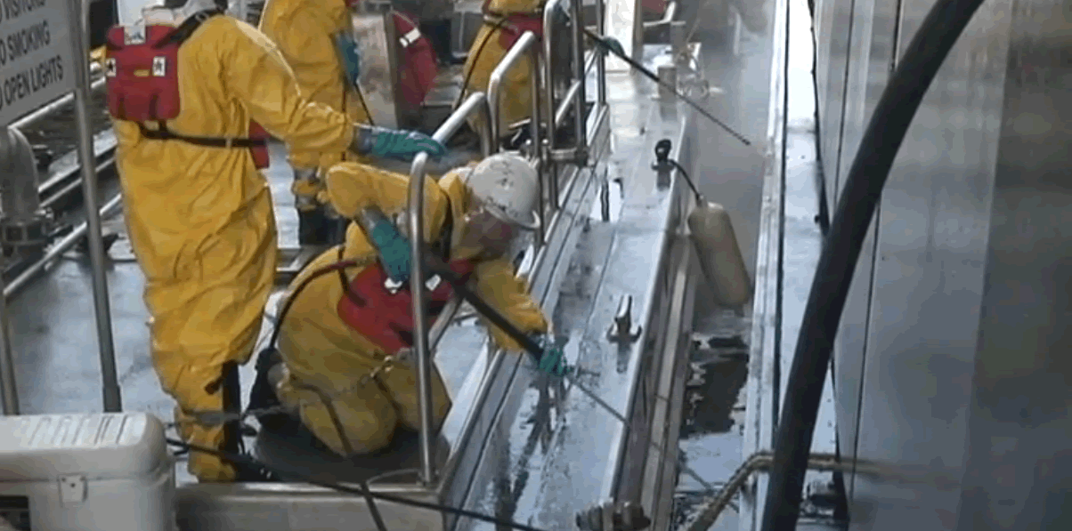 Response personnel applying PES-51 during Deepwater Horizon vessel and equipment decontamination operations.